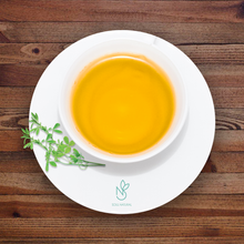 Load image into Gallery viewer, Image of a cup of alfalfa leaf tea

